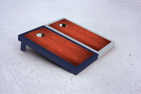 Custom cornhole boards with Navy and Gray borders with Rosewood stained center
