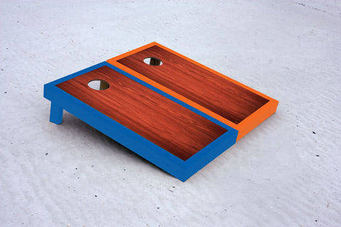 Custom cornhole boards with Blue and Orange borders with Rosewood stained center